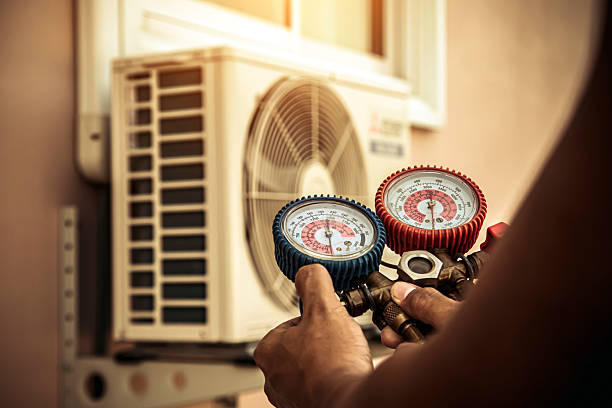 Professional Heat Pump Repair technician working in Lowell, MA